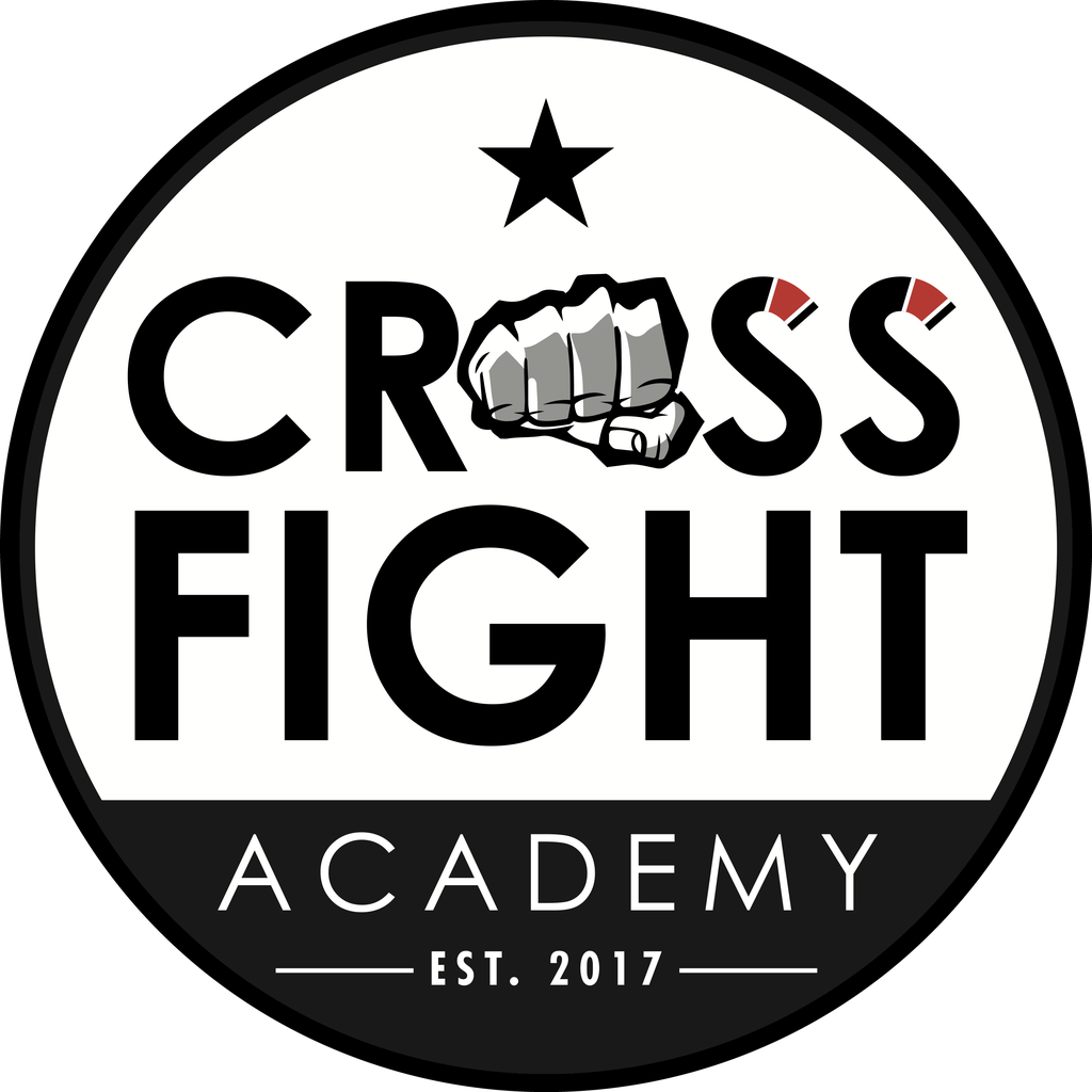 Stemma CrossFight Academy: un pugno chiuso dentro la parola CROSS, sopra FIGHT ACADEMY, fondata nel 2017.
